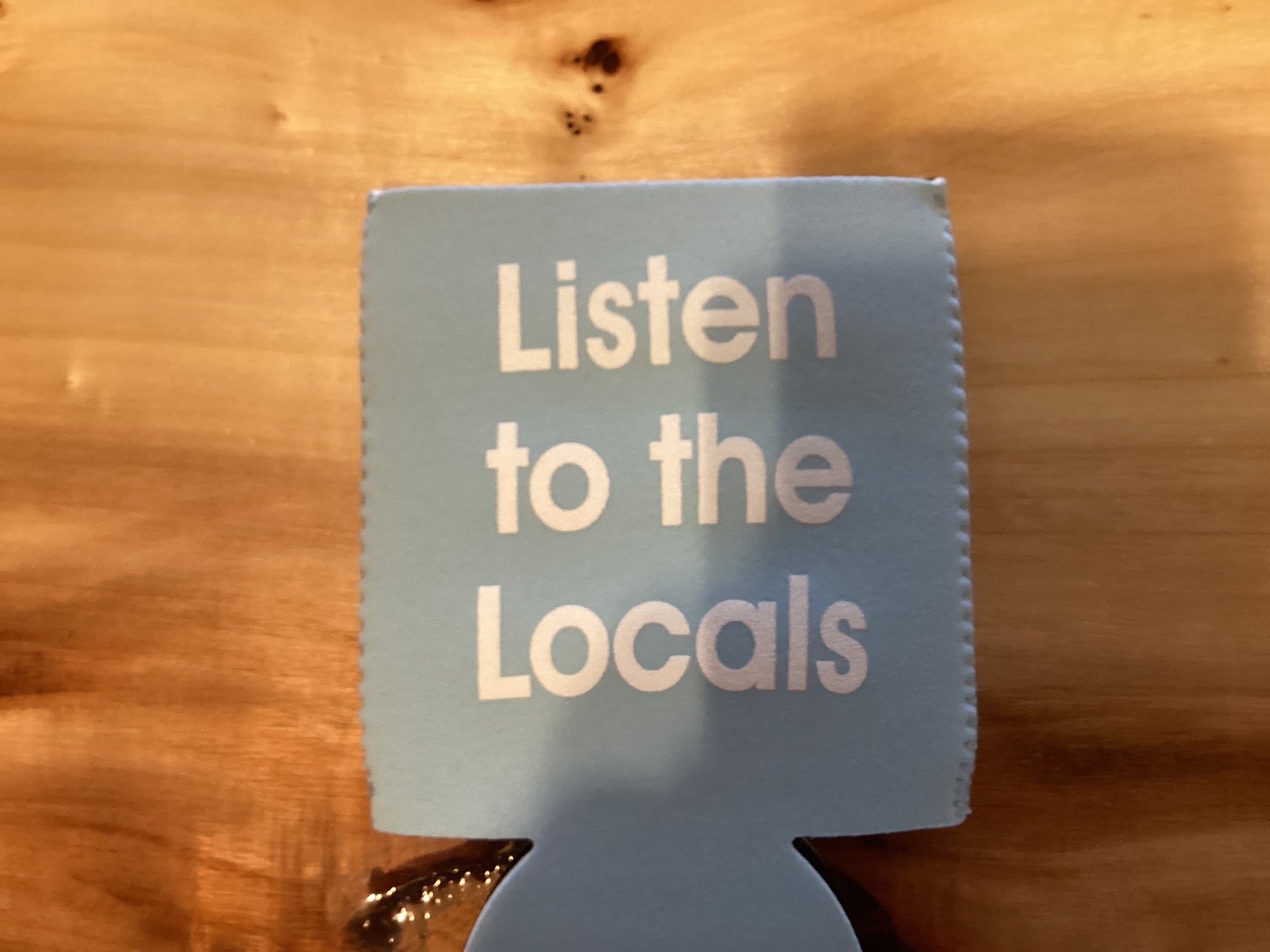 Koozie listen to locals